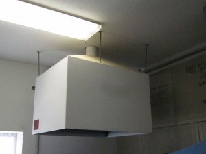 Venting hood connected to a dust collection system