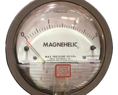 Magnehelic gauge for reading differential pressure in a baghouse