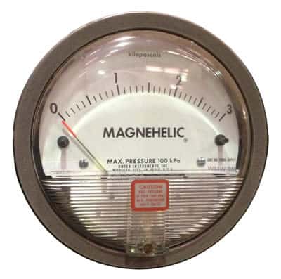 Magnehelic gauge for reading differential pressure in a baghouse