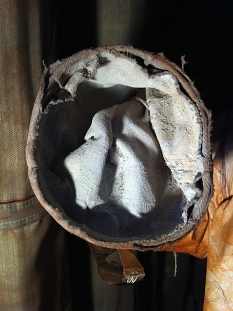An image of the worn-out cuff of a baghouse filter