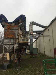 Gibson guitar old baghouse, side view with holes on top